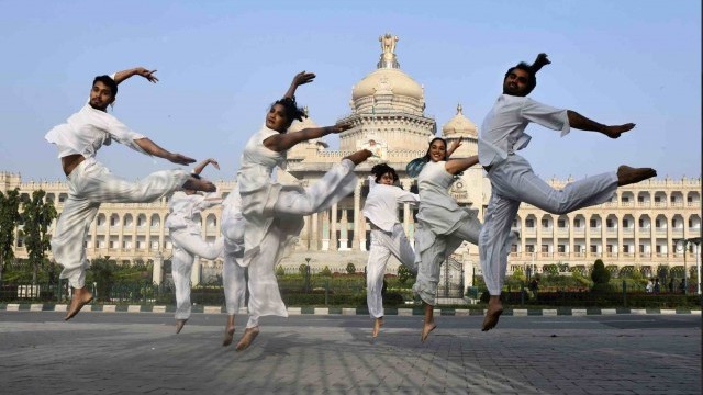 Dancers performing in front of the Vidhan Soudha in Bengaluru