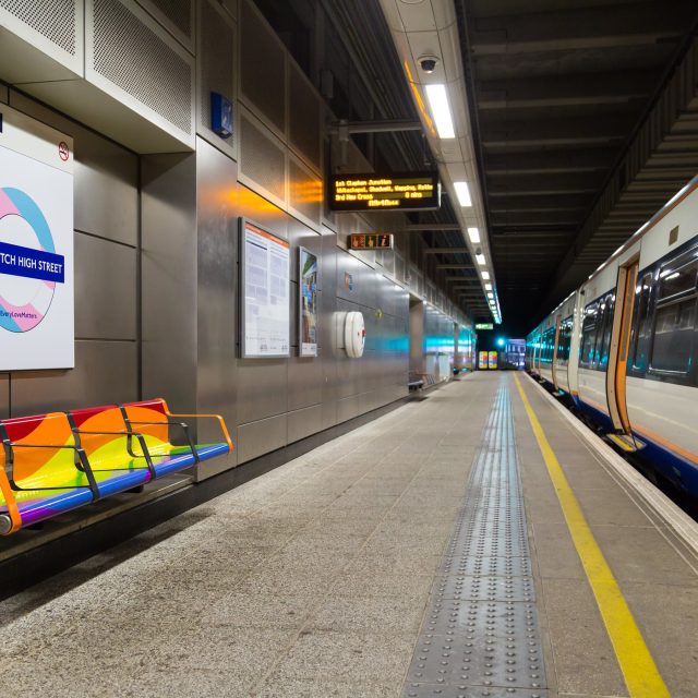A London Overground platform with a special Pride roundel
